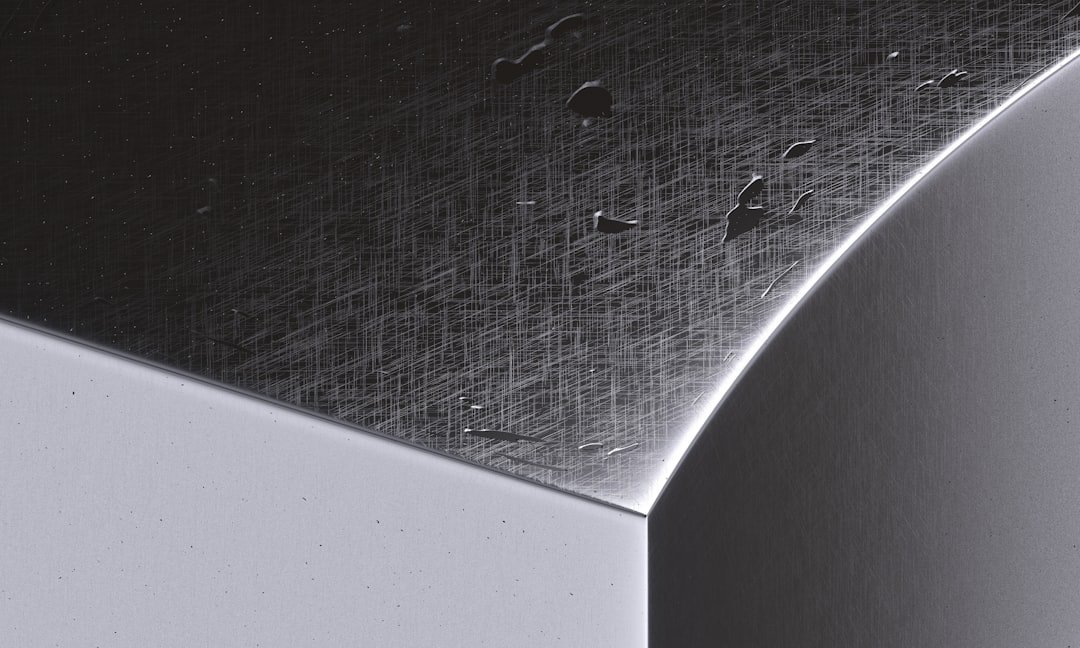 Close-up of plasma cut edge on 1-inch steel plate showing clean, square edge with minimal dross and clearly defined top edge